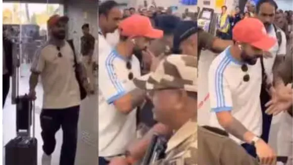 virat kohli hug lady at airport