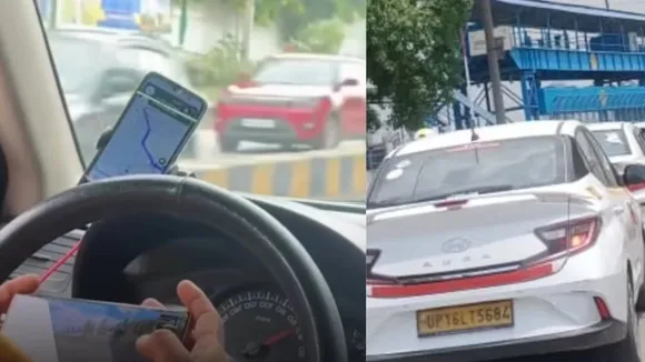 viral video cab driver playing game while driving