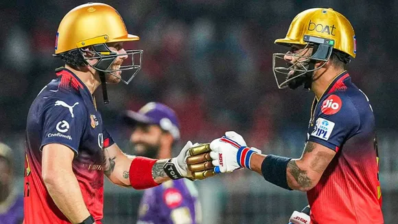 KKR vs RCB Virat Kohli Phil Salt hit fiery fifty RCB beat KKR by 7 wickets in IPL 2025 opener 