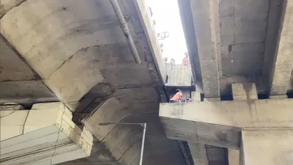 Noida girl stuck on elevated flyover piller