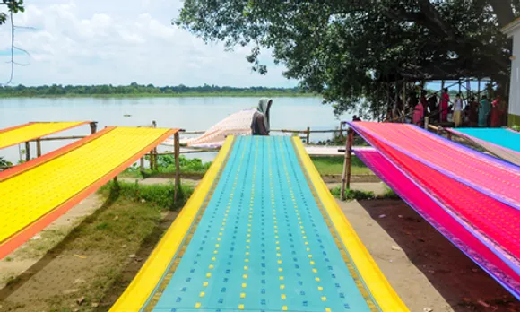 Nadia: Handloom Sarees Dry by Riverside