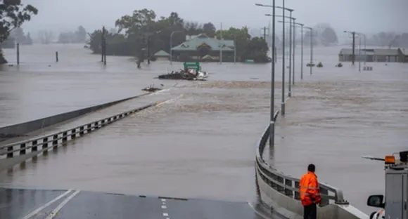Tropical storm prompts life-threatening flash flooding warning in Australia
