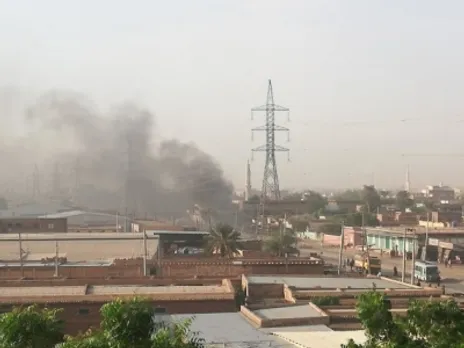 Smoke rises from a site in Khartoum, Sudan, Oct. 25, 2021,