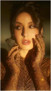 नोरा फतेही के हॉट लुक ने बढ़ाया इंटरनेट का पारा, देखें PICS