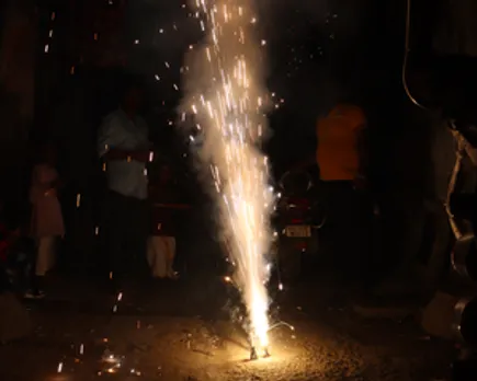 New Delhi : People light firecrackers to celebrate Diwali