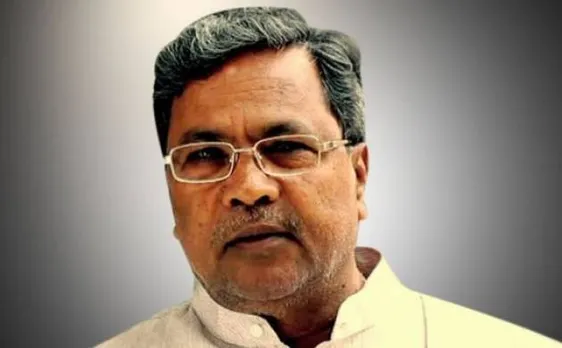 कर्नाटक सीएम सिद्धारमैया फिर विवादों में, किसी और से जूते का फीता बंधाने का वीडियो आया सामने