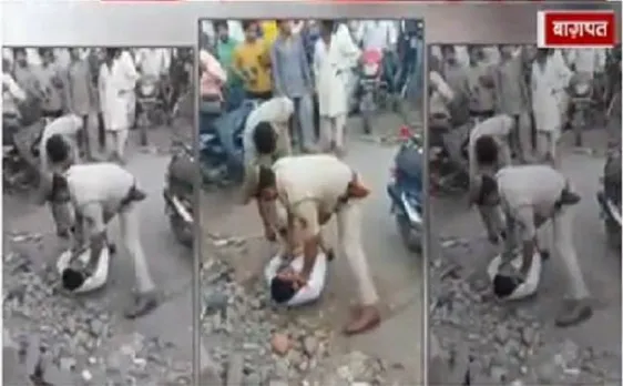 उत्तर प्रदेश के बागपत में दरोगा और युवक के बीच हाथापाई का वीडियो हुआ वायरल