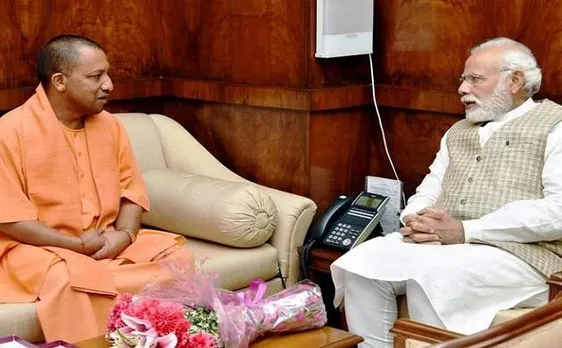 सीएम आदित्यनाथ ने प्रधानमंत्री मोदी के सामने रखी यूपी सरकार की रिपोर्ट कार्ड, किसानों की कर्ज माफी और संकल्प पत्र पर दी जानकारी