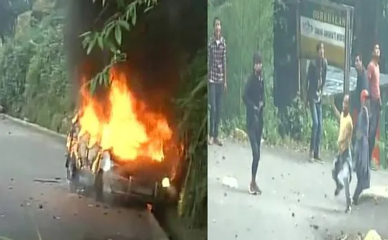 गोरखालैंड की मांग कर रहे GJM का आंदोलन हुआ हिंसक, मीडिया वैन में लगाई आग, सुरक्षाकर्मियों पर फेंके पत्थर