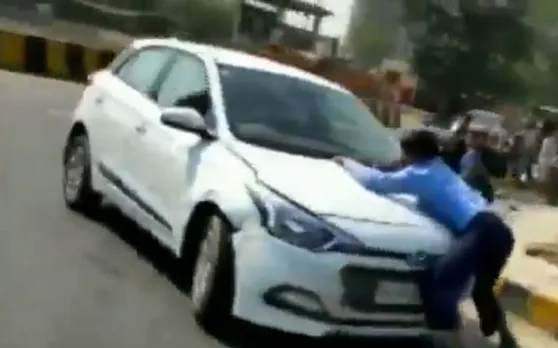 गाजियाबाद में रोडरेज: बोनट पर कैब ड्राइवर को लटकाकर 2 Km तक भगाई कार, देखें VIDEO