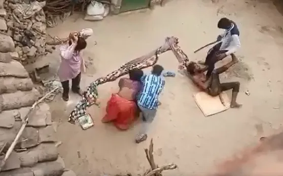 कानपुर में मारपीट का Video वायरल, बचाने आई महिला को भी पीटा