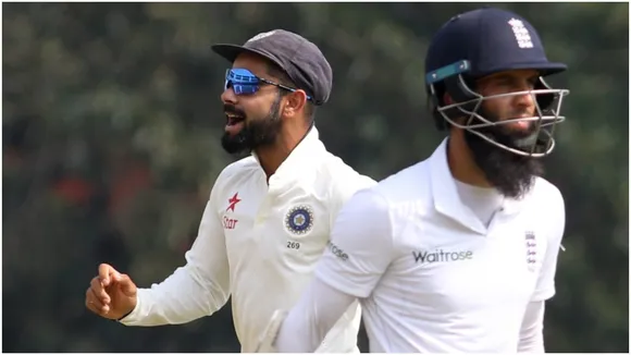 Indian captain Virat Kohli celebrates the wicket of Moeen Ali