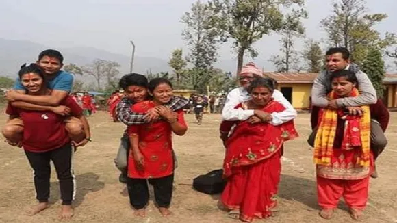 Women Race with Carrying her Husband