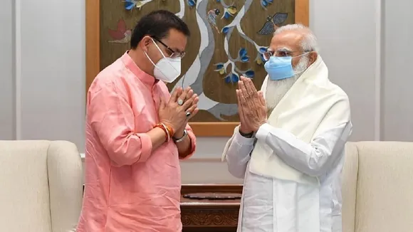 cm dhami with pm modi