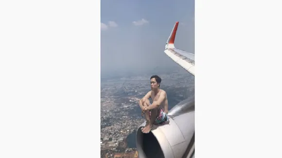 Afghani wrapped on a flying plane