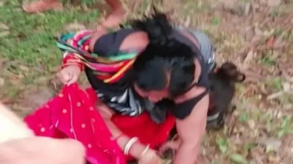 Woman Thrashed