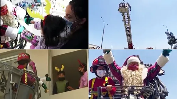 Santa clause distribute Christmas gifts in a special way