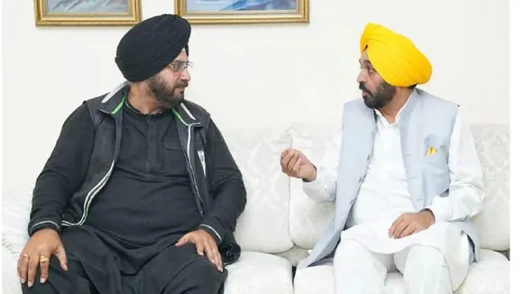 Navjost Singh Sidhu and Bhagwant Mann