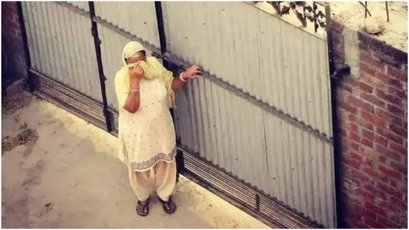 A Picture Of Soldier With His Mother