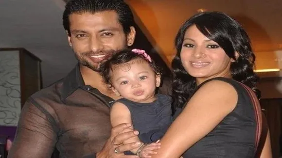 Barkha Bisht with her husband and daughter