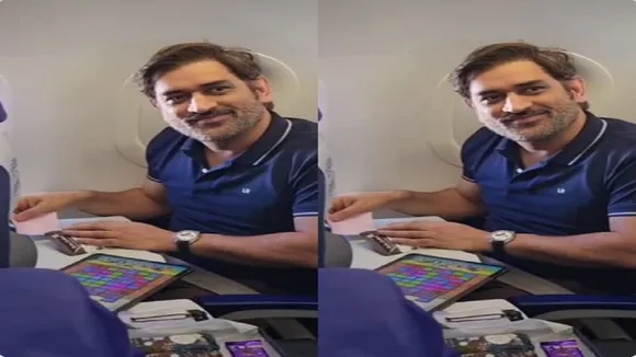 ms dhoni video playing candy crush air hostess offer chocolates