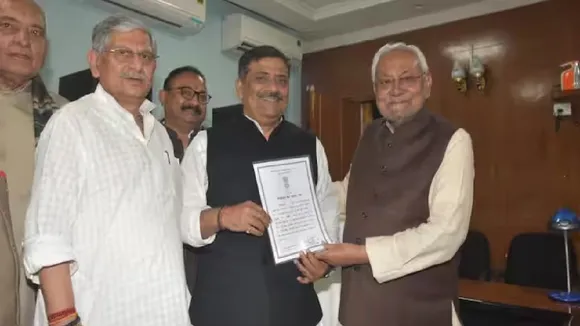 nitish kumar and sanjay jha