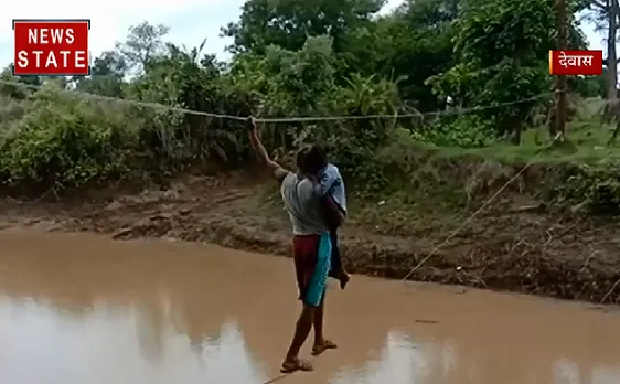 Madhya Pradesh : मौत और जिंदगी के बीच एक तार का फासला, देखिए VIDEO 