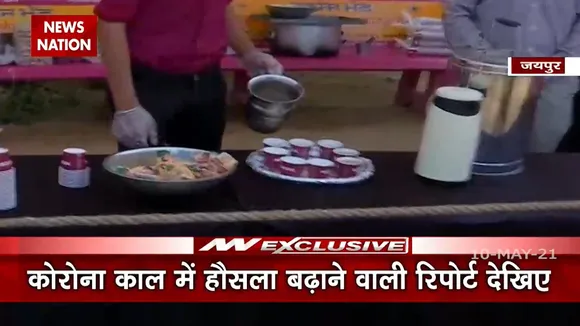 राजस्थान में कोरोना मरीजों के परिजनों के लिए अस्पताल में बाहर लगा खाना