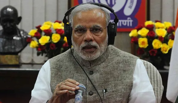 Prime_Minister_Narendra_Modi_during_his__Mann_ki_Baat__on_All_India_Radio_(cropped)_(cropped)
