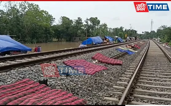Assam: Flood-Hit People take shelter along Railway Tracks in Kampur
