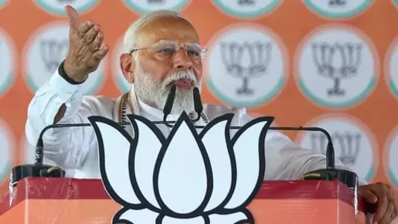On Mother's Day, PM Modi Receives Portrait of Late Mother at Bengal Rally