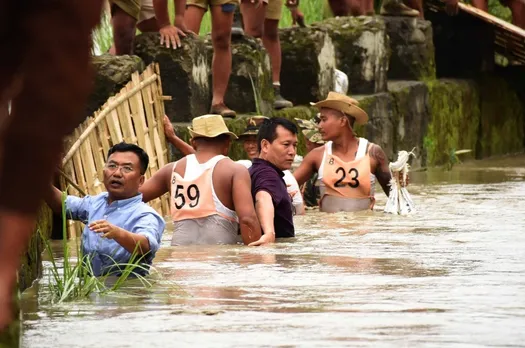 Manipur | IAS officer and minister leads flood relief operation in waist-deep water