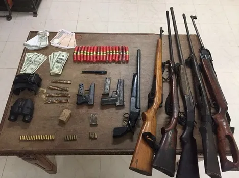 Huge cache of arms & ammunition and cash recovered in Kohima
