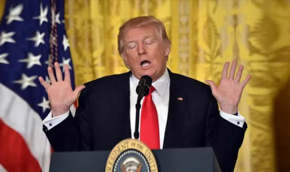 Trump admits son met Russian for information on opponent