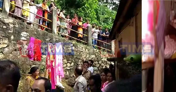 Woman found dead hanging from ceiling