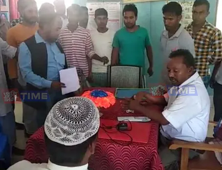 Caught red-handed! Headmaster takes bribe on NRC