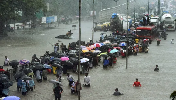 Rains paralyse Mumbai, train, flight services hit