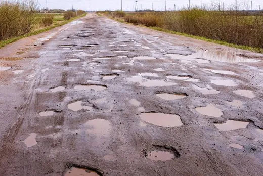Potholes, Non-working signal lights… should have penalty!