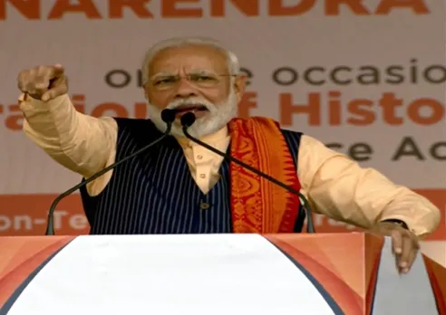 Kokrajhar: PM Modi Hits At Rahul Gandhi for ‘Beating with Stick’ Remark