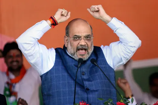 Amit Shah talks on containing COVID-19, lambastes Gandhi family