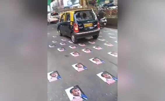Posters Of French Prez Pasted On Mumbai Roads