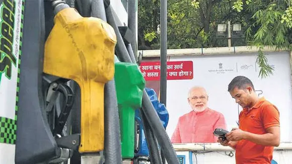 ECI Directs Petrol Pumps To Remove Posters Of  PM Modi Within 72 Hrs