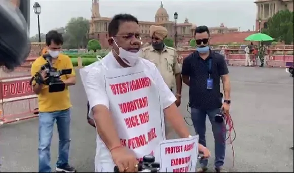 Delhi: Ripun Bora Rides Bicycle to Parliament in Protest Against Fuel Price Rise