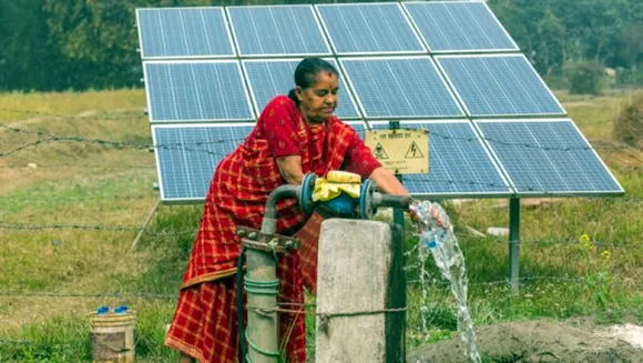solar panel hadled by women