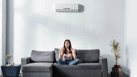 sitting in an AC 