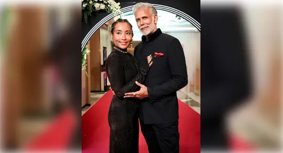Milind soman with wife