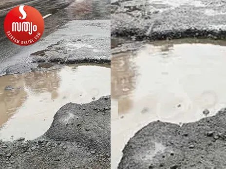 huge pit on road