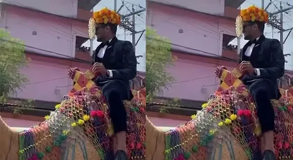 GROOM-ON-CAMEL.png