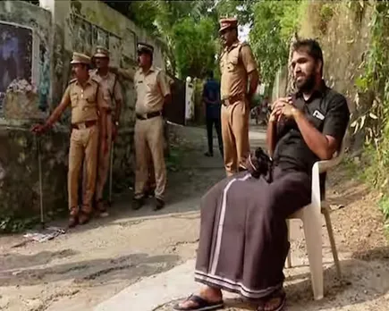 chandy oomman black.jpg