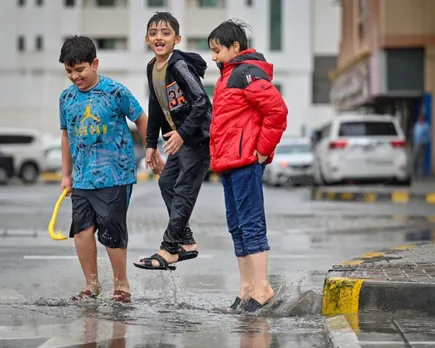 rain-in-uae-childrens-play-in-the-rain